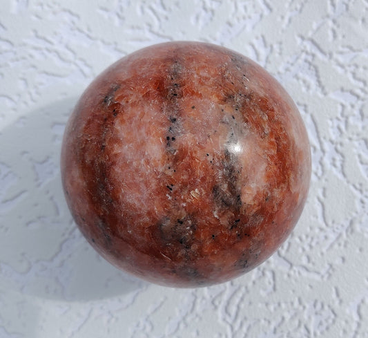 Sunshine Glow: Vibrant Orange Calcite Sphere for Positive Energy and Creativity